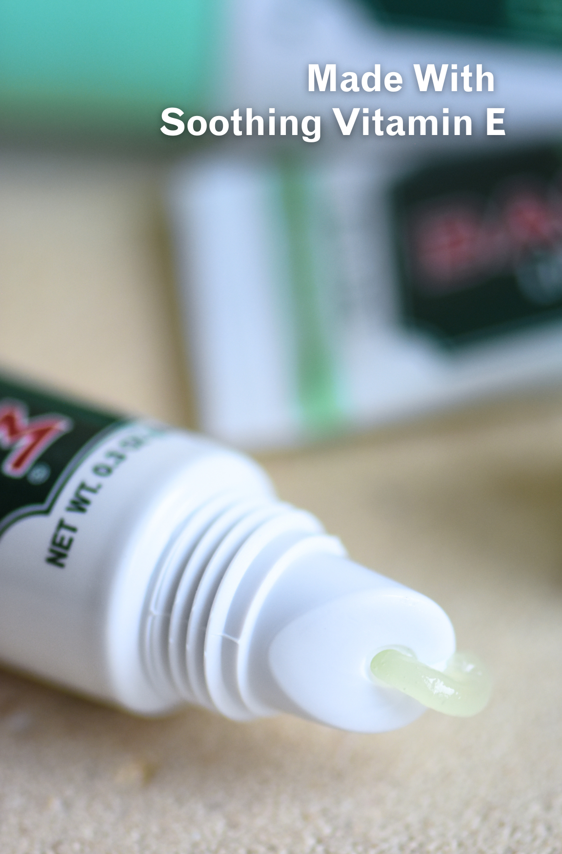 Close up of lip balm coming out of tube