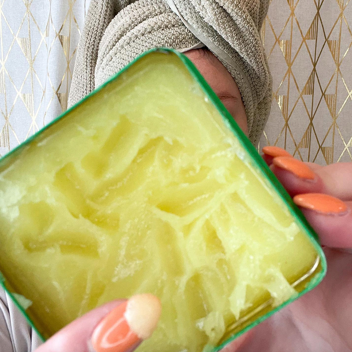 An open tin of Bag Balm