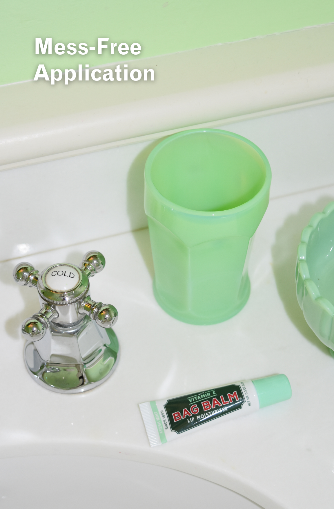 Tube of mint lip balm in green bathroom