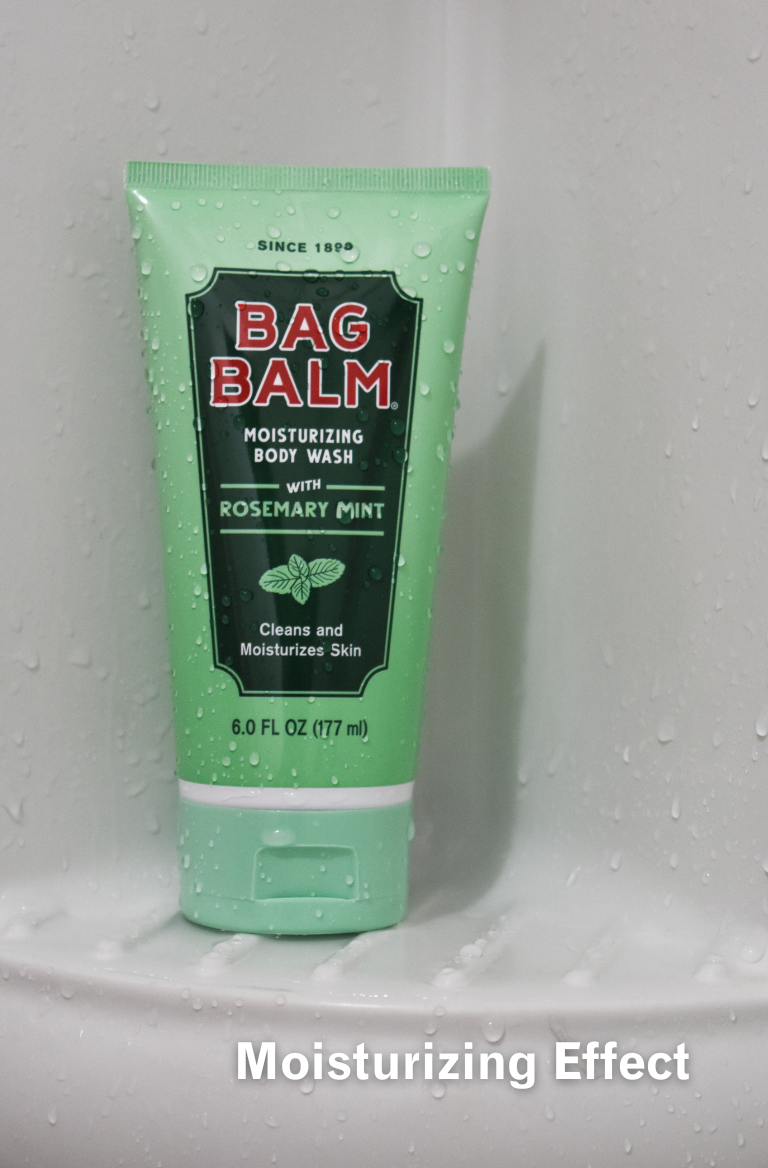 body wash on shower shelf with water droplets