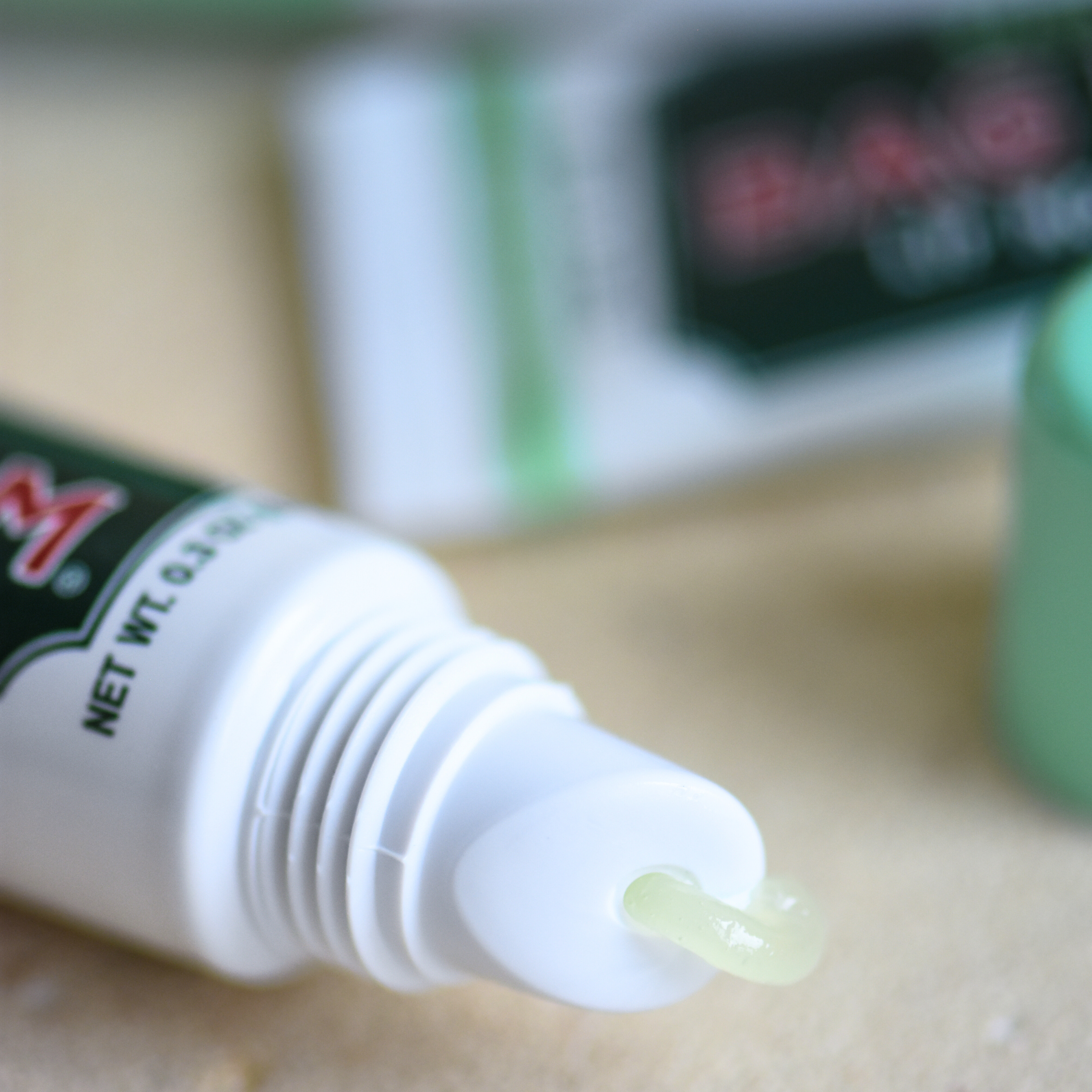Close up of lip balm coming out of tube
