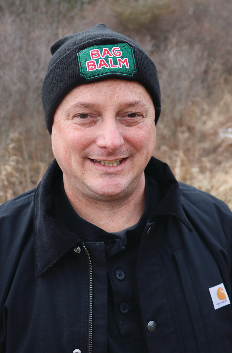 Person Wearing Bag Balm Black Beanie