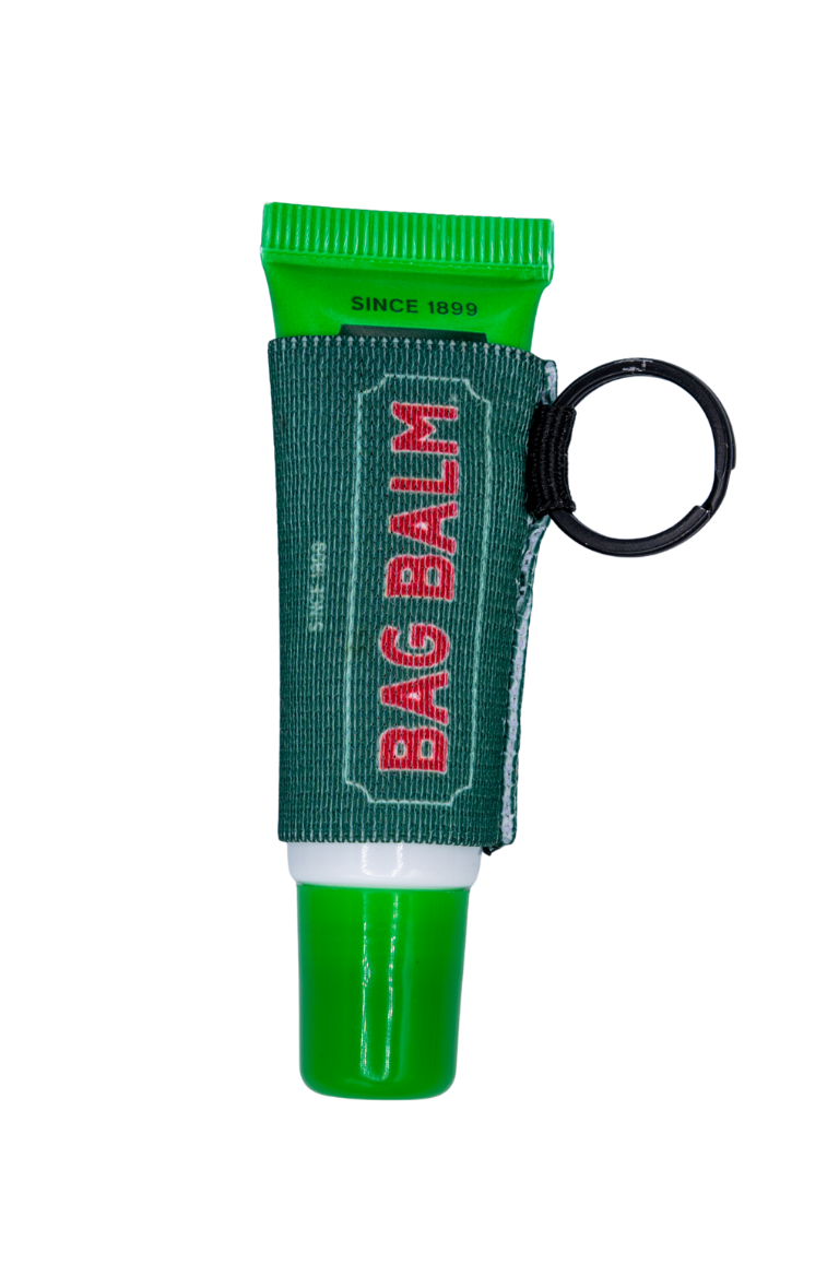 Green elastic lip balm holder with a black key ring 