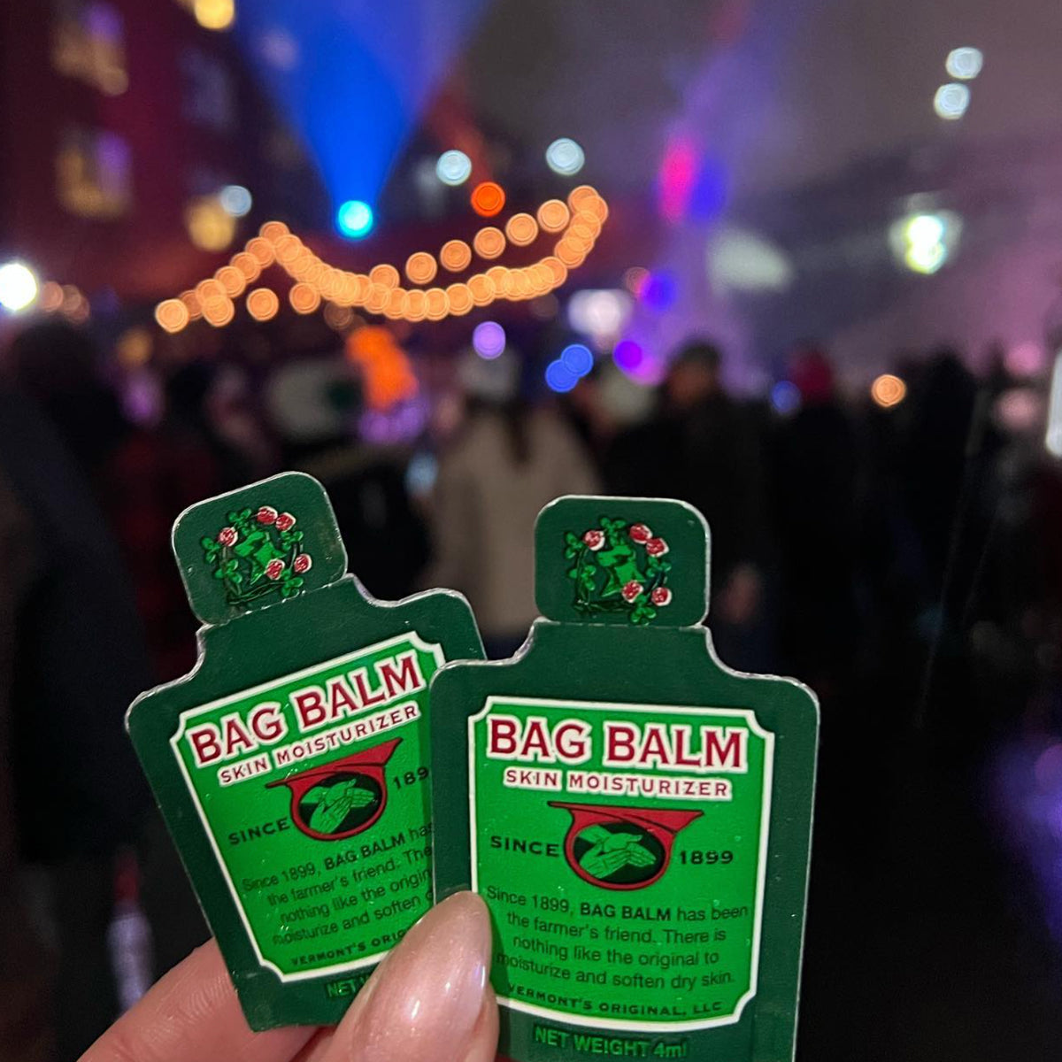 Two green sachets of Bag Balm skin moisturizer